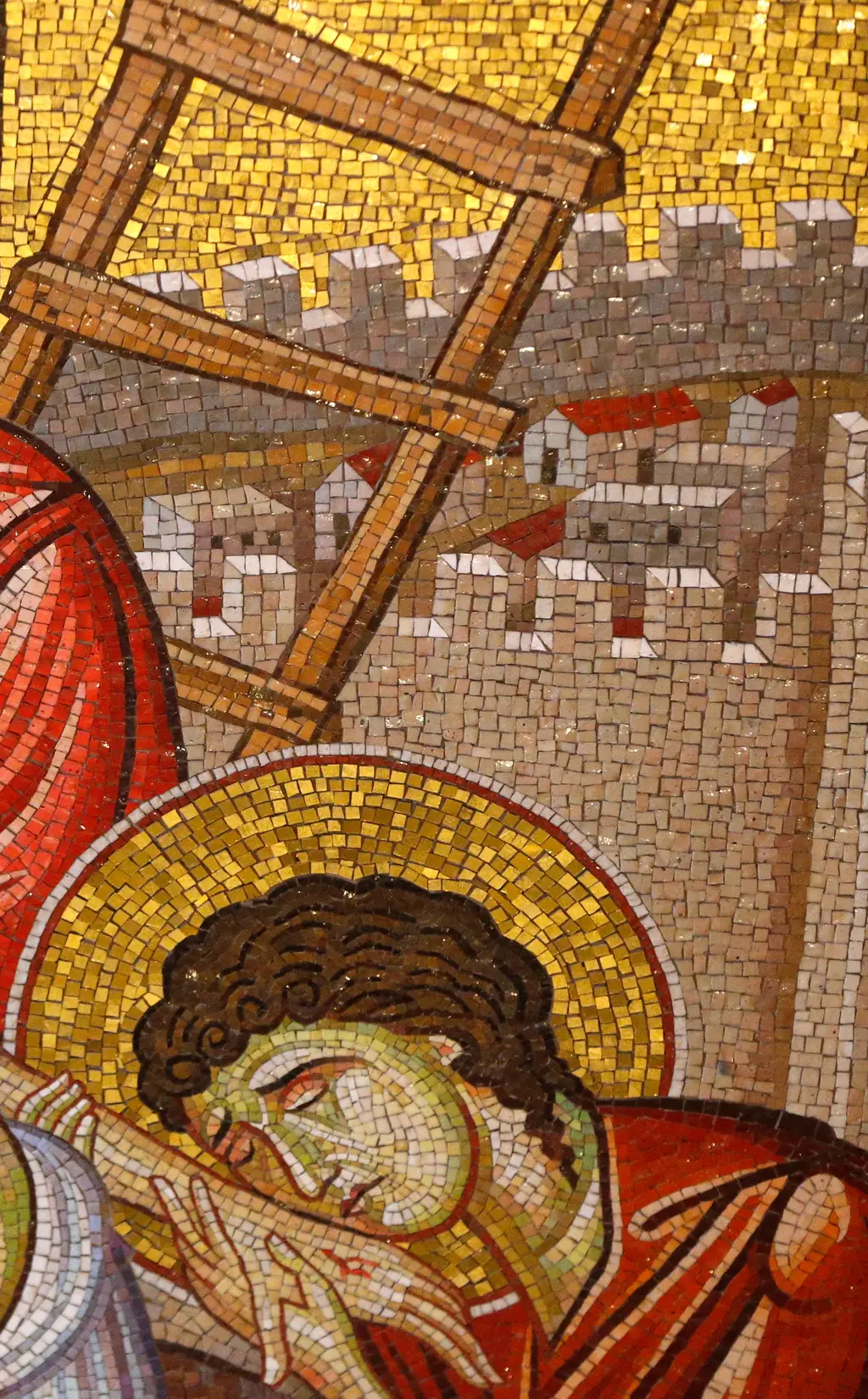 Mosaic detail of the deposition: the ladder set against the walls of Jerusalem, a mourner bowed beneath it.